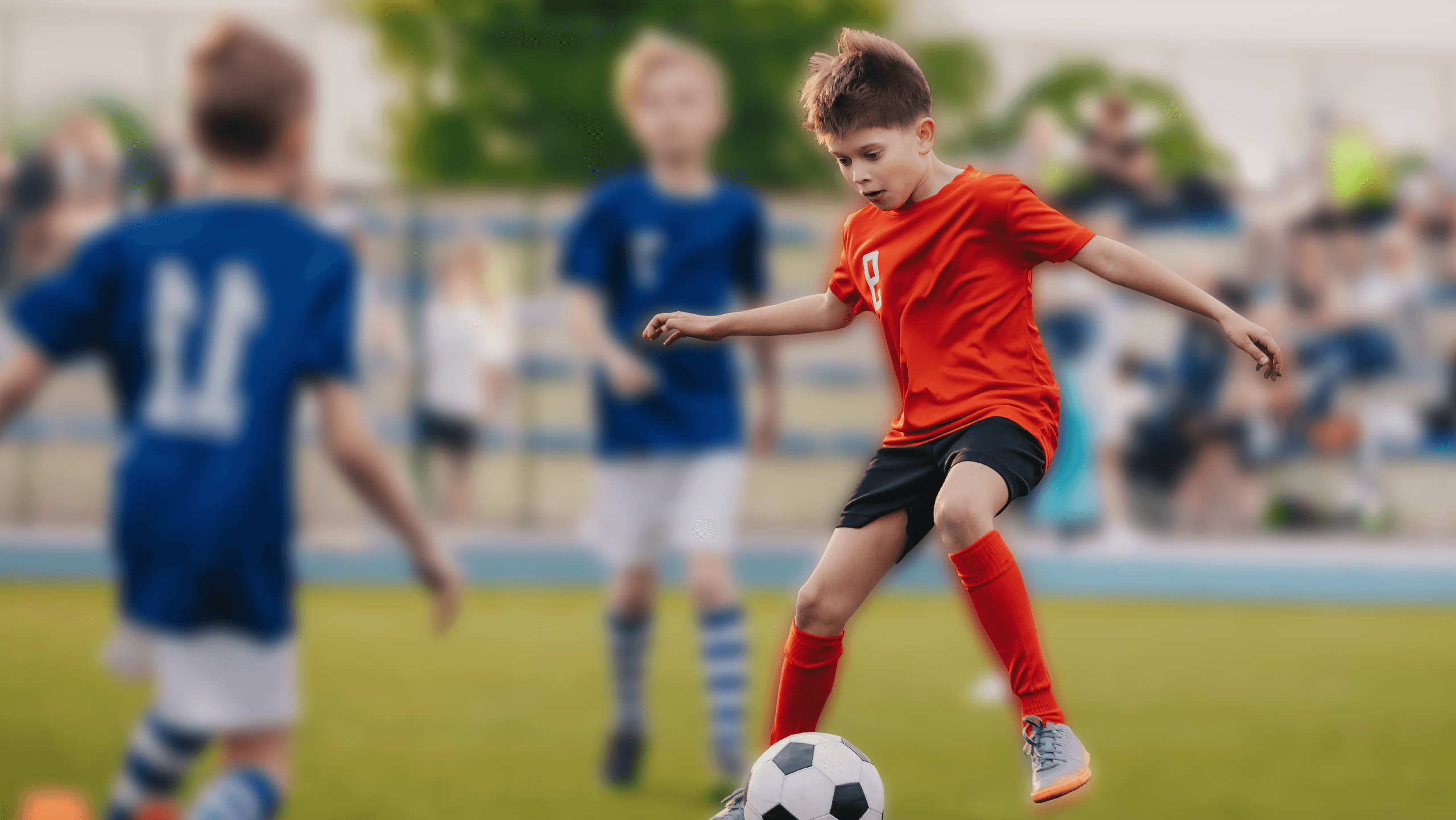 Young football player in action